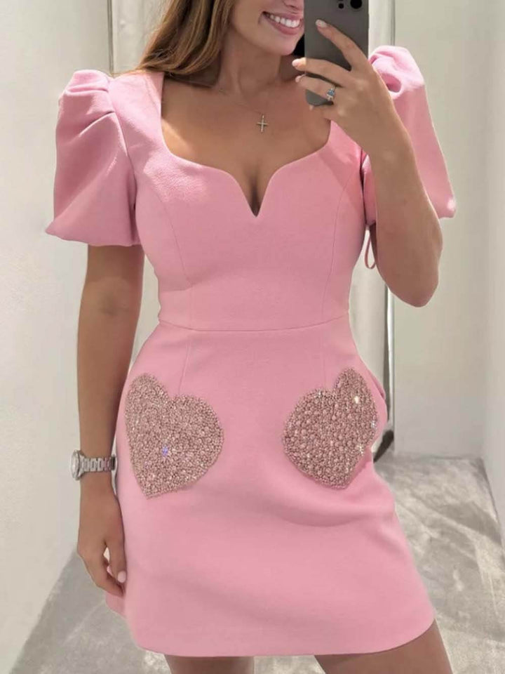 Elegante y dulce vestido de noche de lentejuelas con mangas abullonadas