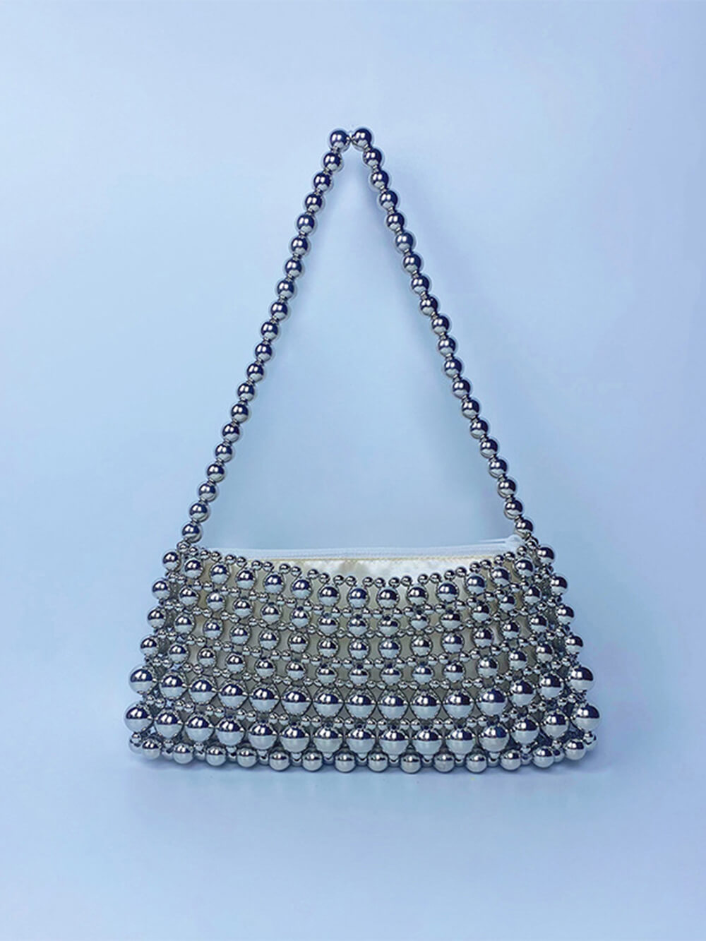 sac à main vintage avec chaîne de perles