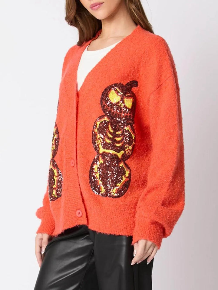 Maglione cardigan con lustrini della vigilia di Halloween, zucca e diavolo