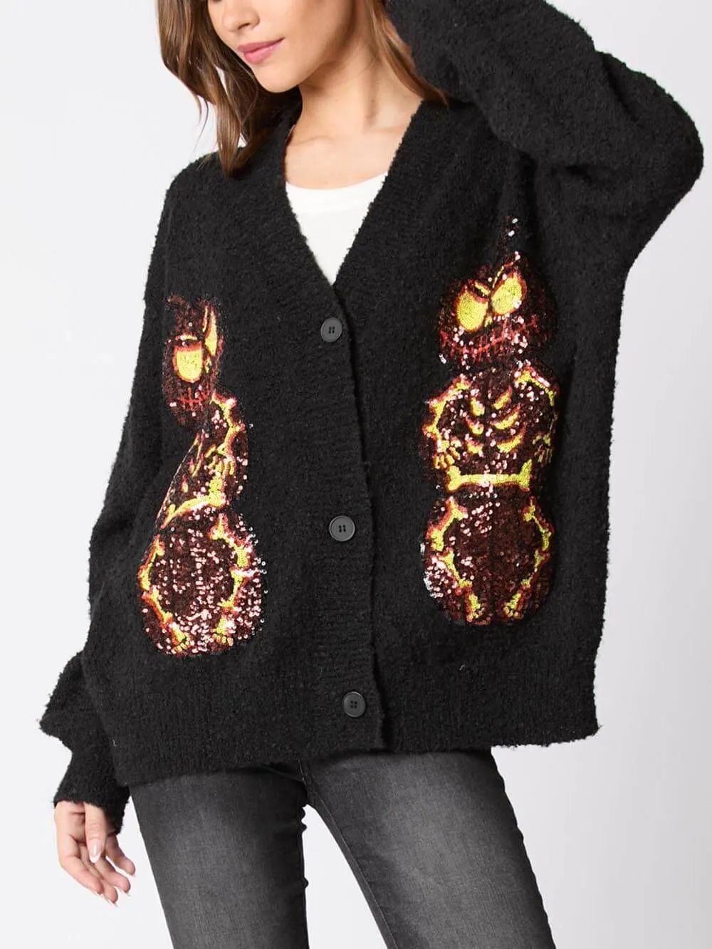 Maglione cardigan con lustrini della vigilia di Halloween, zucca e diavolo