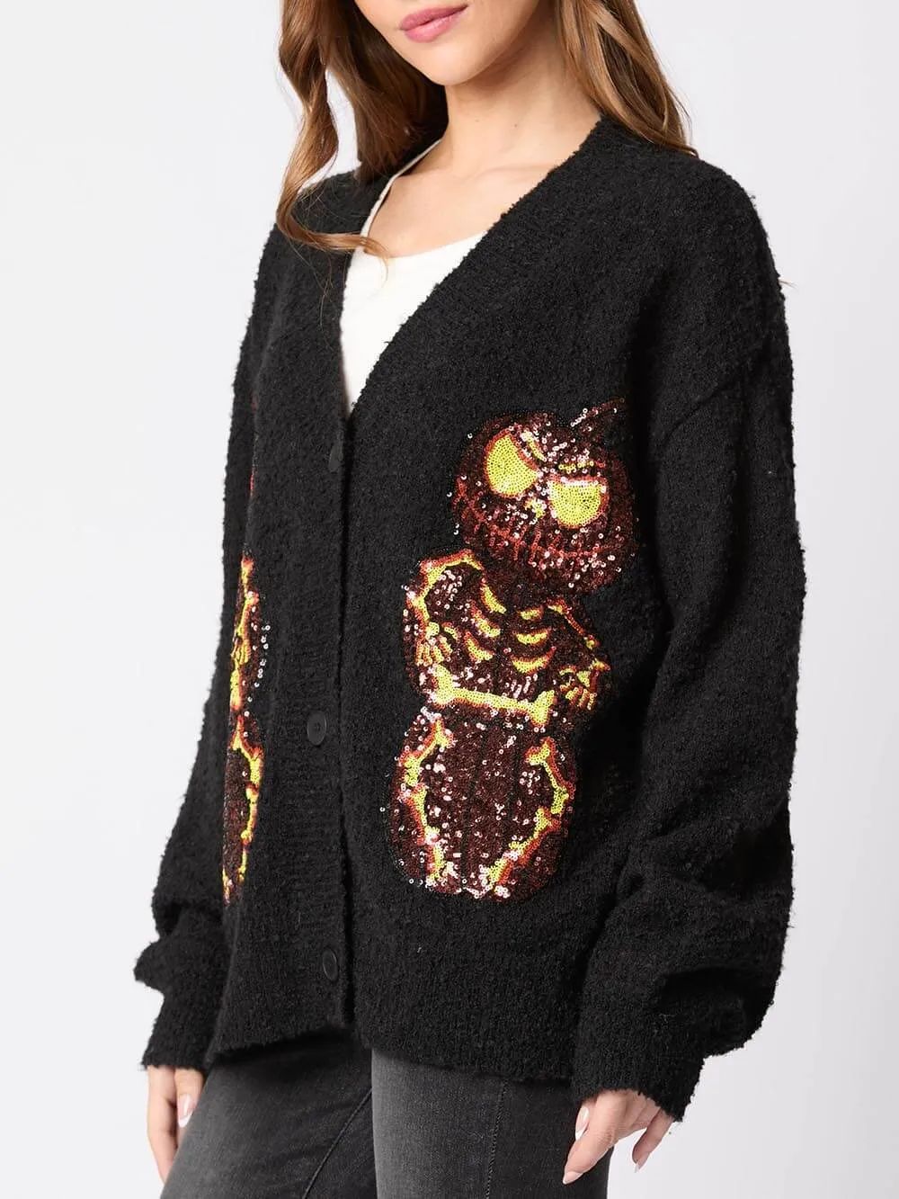 Maglione cardigan con lustrini della vigilia di Halloween, zucca e diavolo