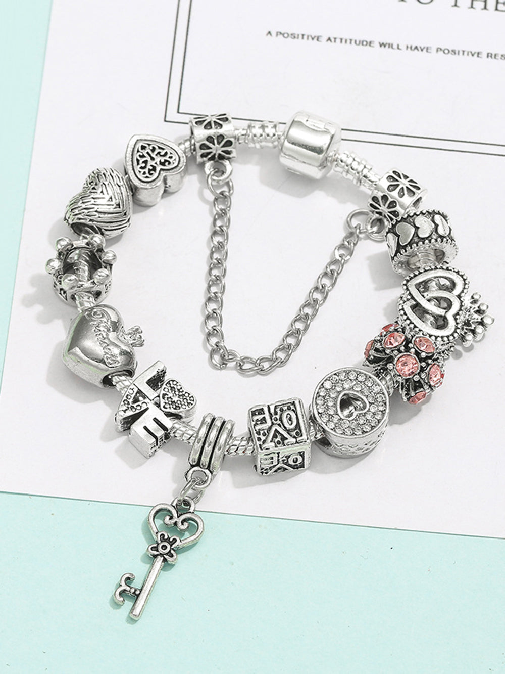 Pulsera de amor con llave y cerradura de corazón