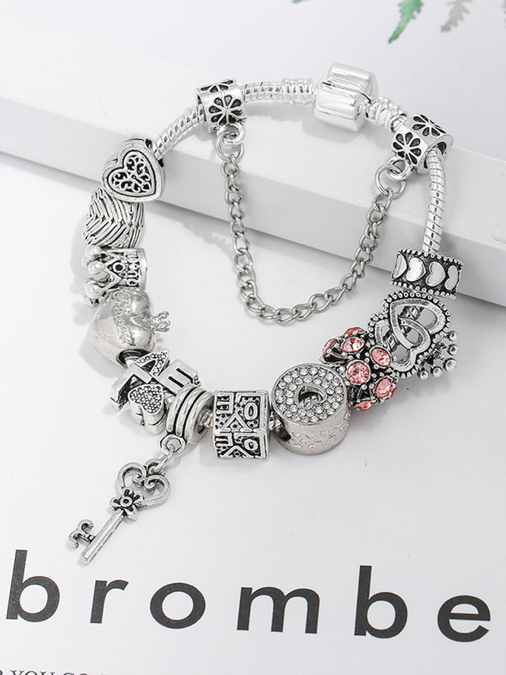 Pulsera de amor con llave y cerradura de corazón