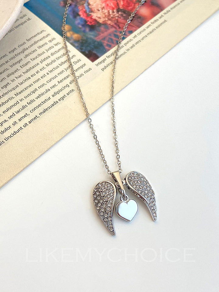 Collier d'amour avec ailes d'ange et diamants