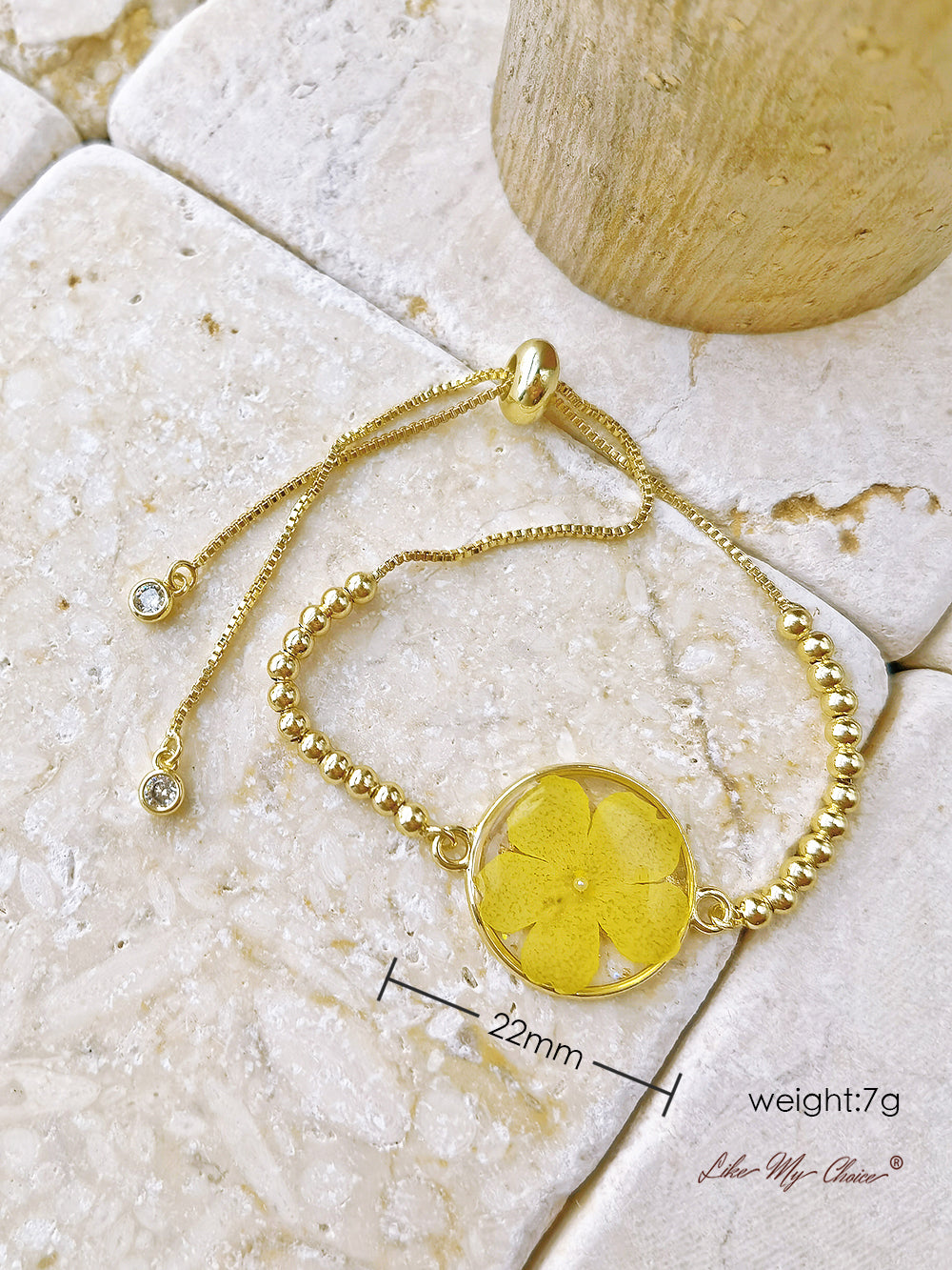 Bracciale rotondo giallo con rilievo epossidico