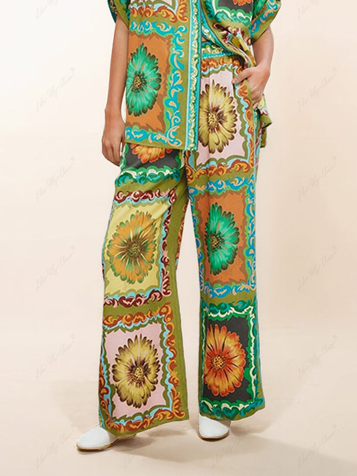 Pantalones de pata ancha con estampado de girasoles