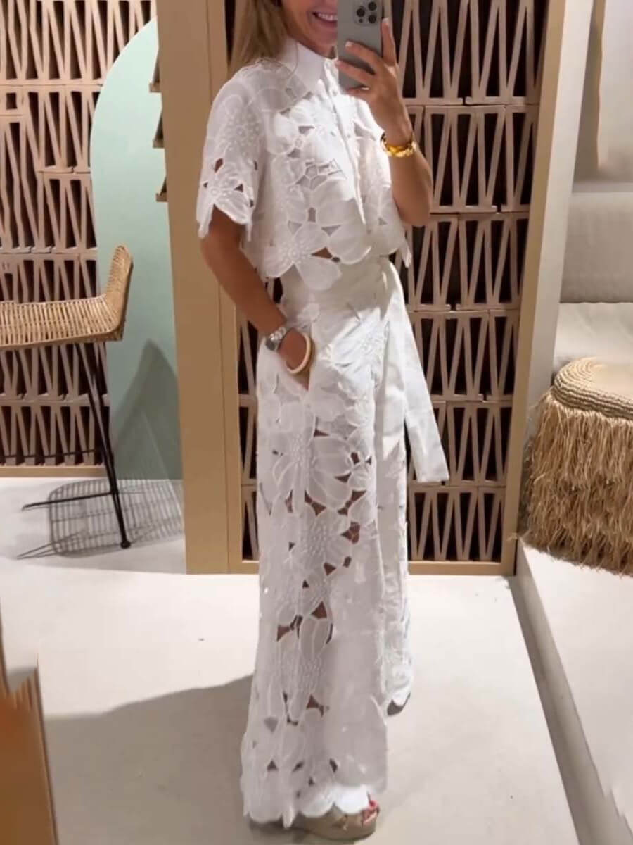 Exquisito pantalón de pata ancha de encaje hueco con bordado floral