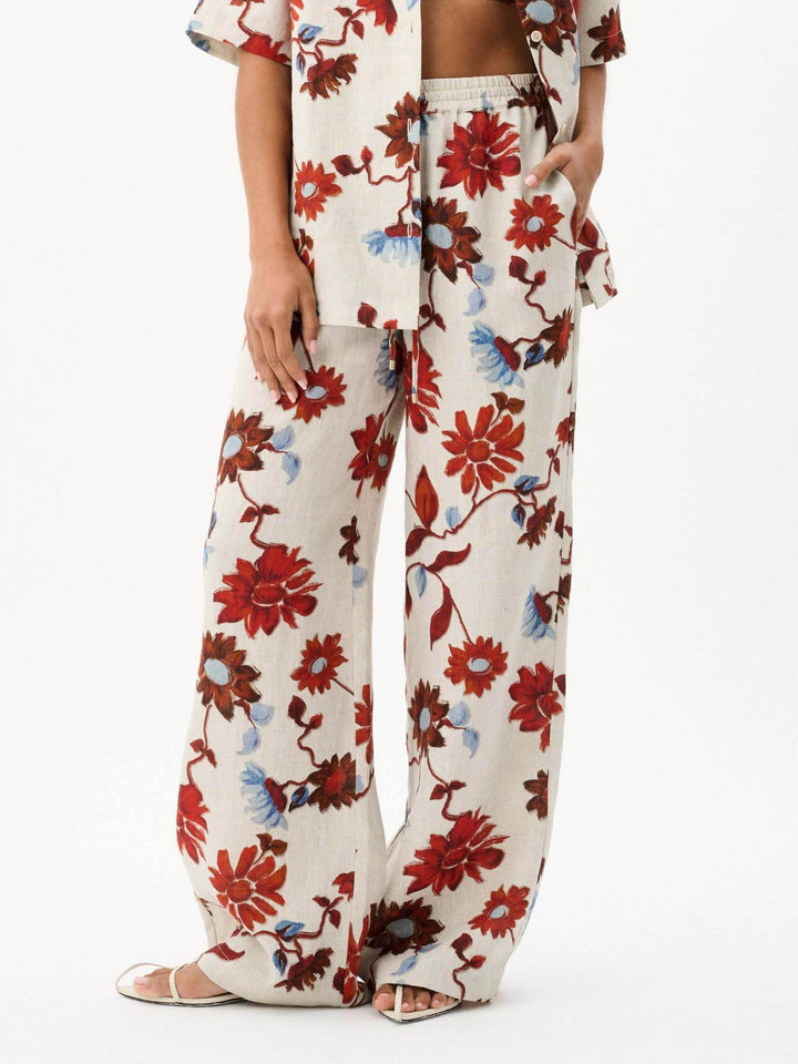 Exquisito pantalón de pata ancha con encaje y estampado floral