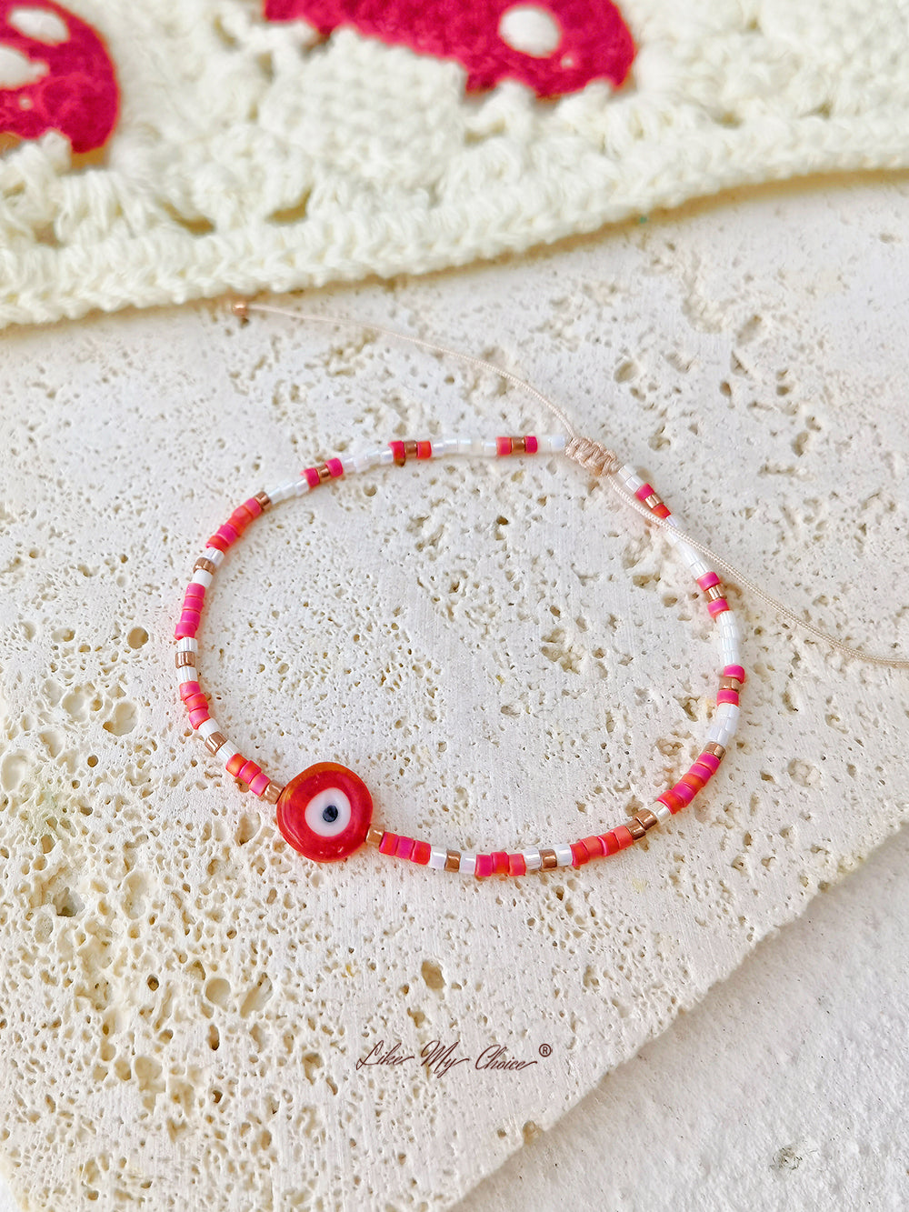 Bracelet réglable en perles avec cordon de serrage Oeil rouge