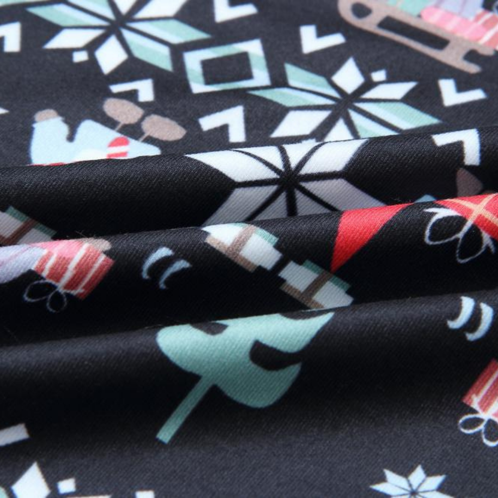 Conjunto de pijama a condizer para a família com estampado de Pai Natal e floco de neve