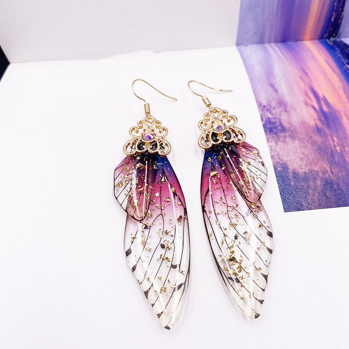 Boucles d'oreilles Aile de papillon en strass violet Aile de cigale en cristal