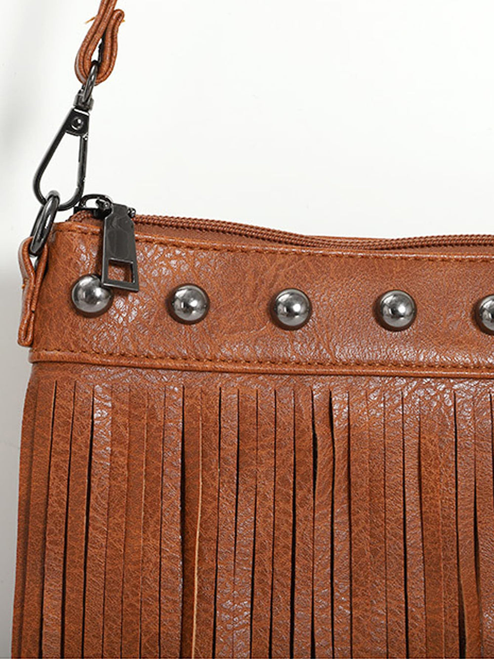 Bolso Crossbody decorado con flecos