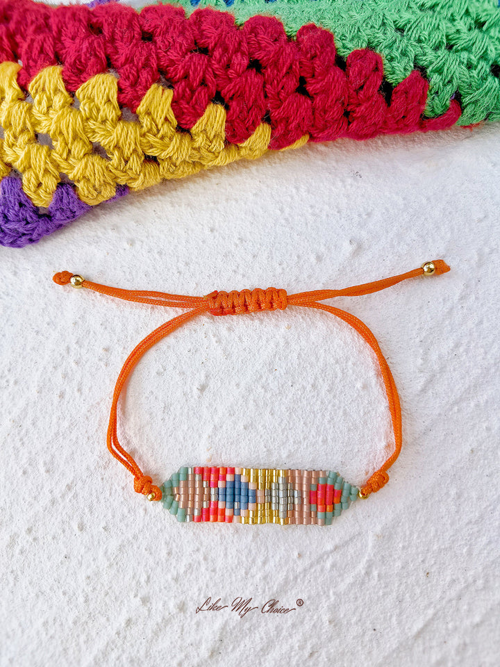 Pulsera ajustable de cordón con cuentas geométricas naranja