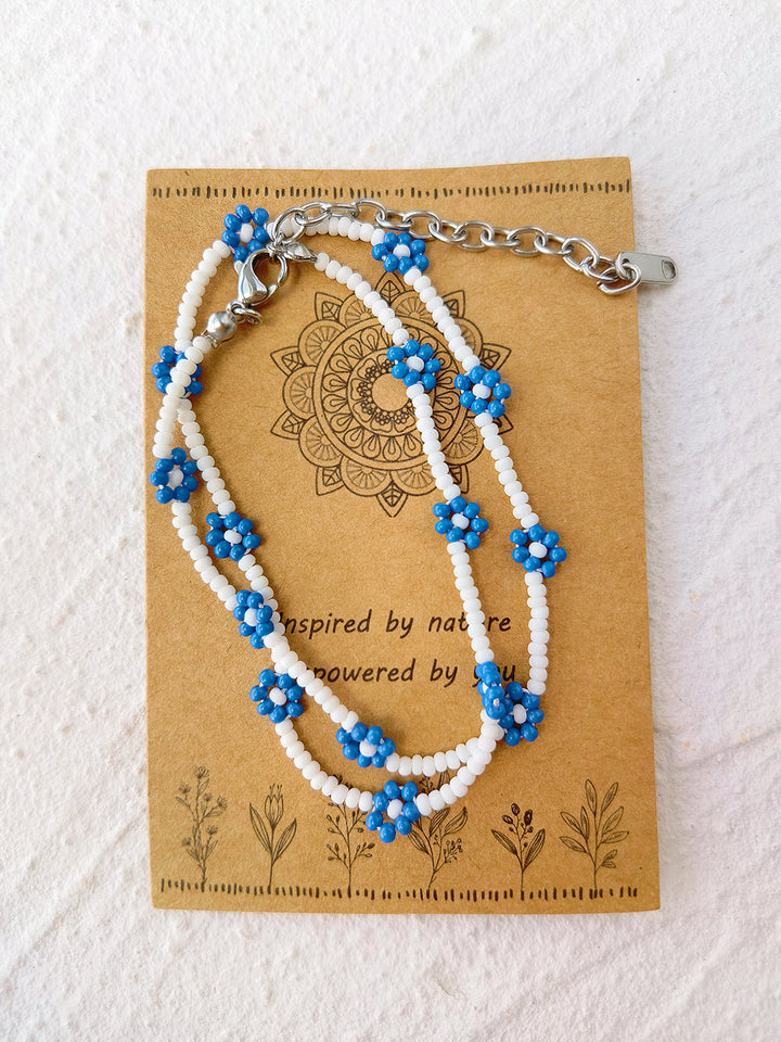 Pulsera ajustable de cordón con cuentas margarita azul