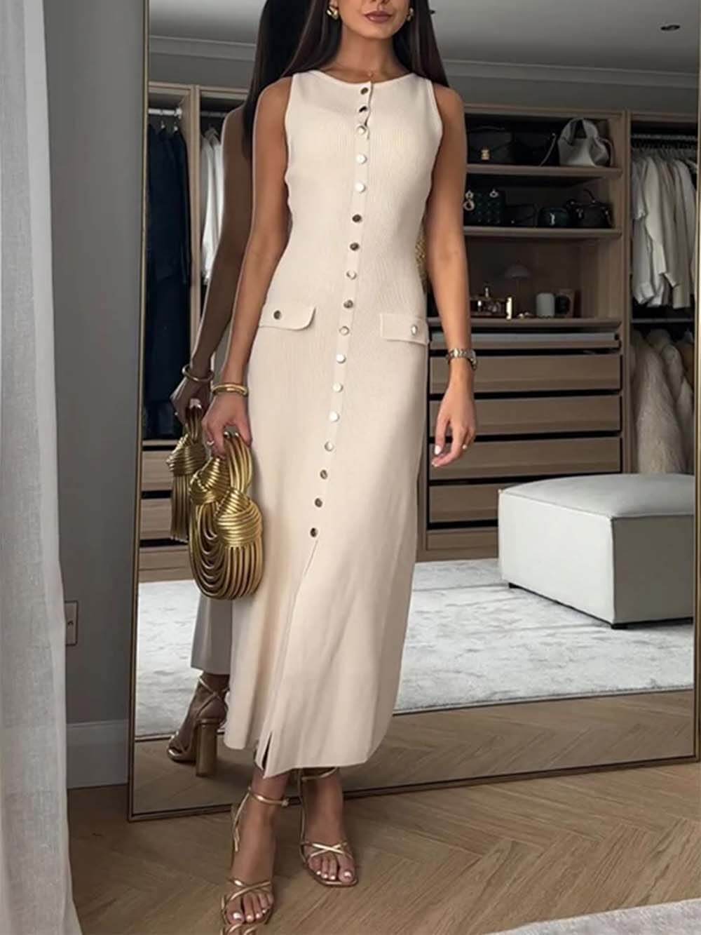 Elegante midi dress in maglia senza maniche con abbottonatura a girocollo