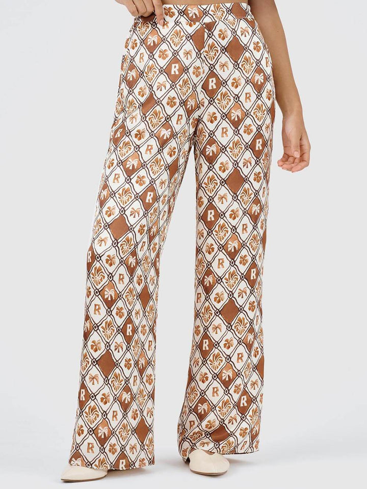 Exquisitos pantalones de pata ancha con bolsillos estampados estilo océano