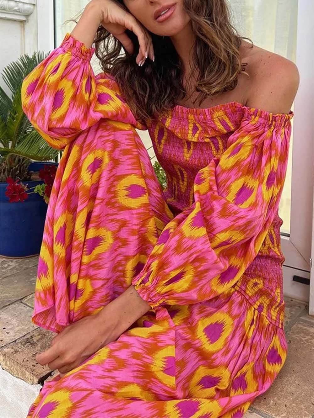 Vestido midi estampado con mangas globo y hombros descubiertos