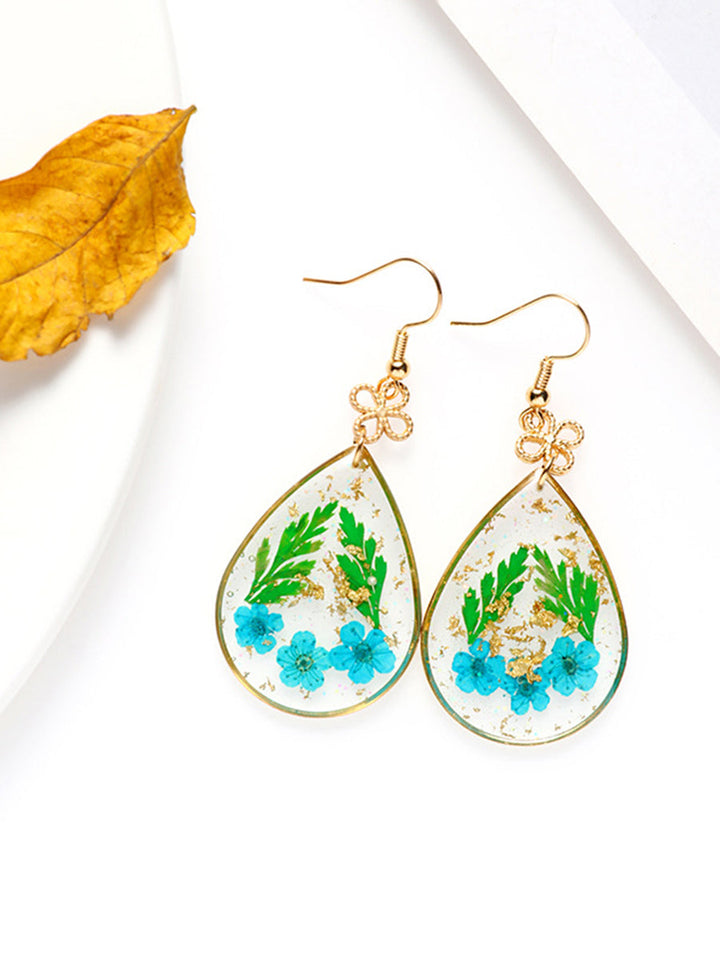 Boucles d'oreilles myosotis en résine avec feuille d'or