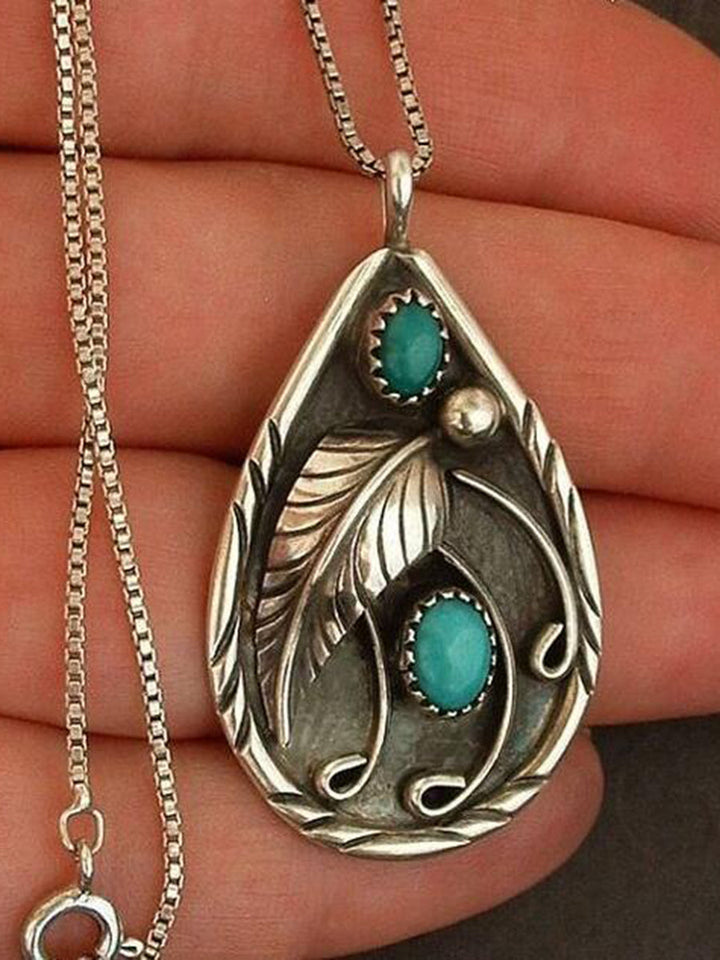 Turquoise veer hanger ketting