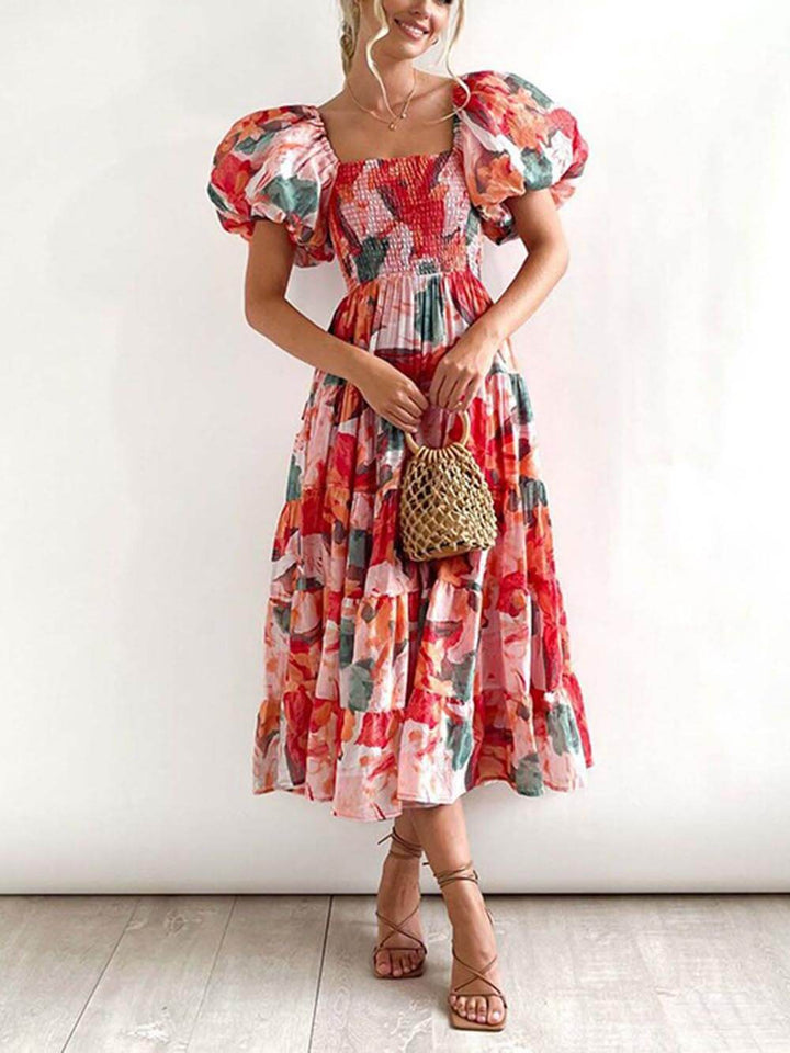 Vestido midi con volantes y estampado floral