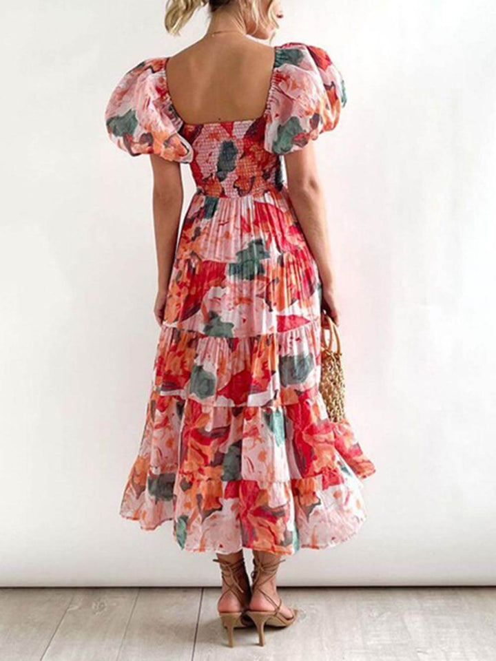 Vestido midi con volantes y estampado floral