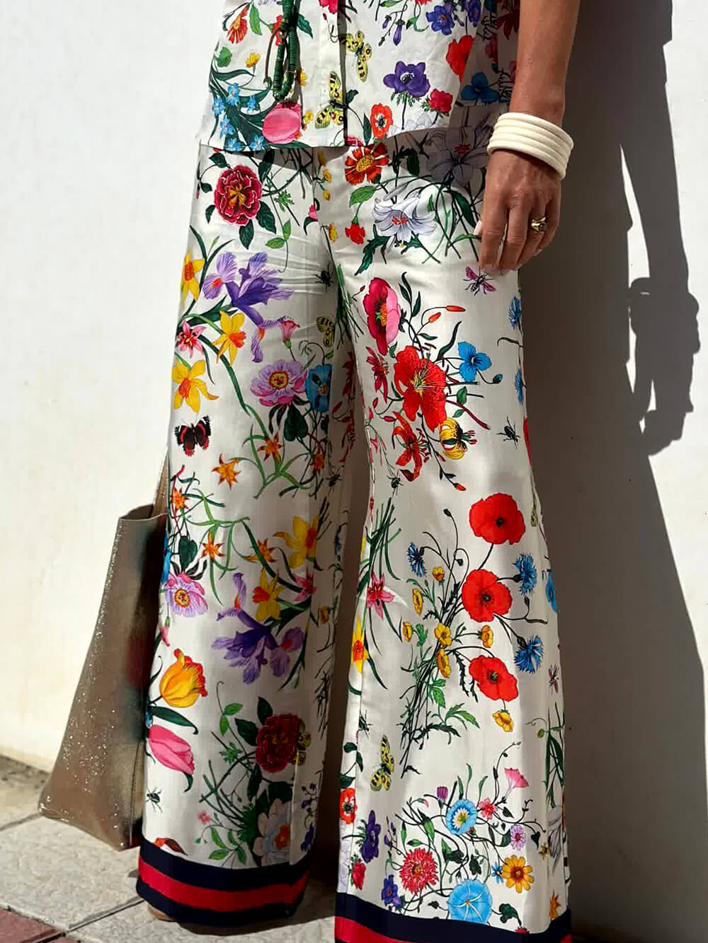 Pantalones de pernera ancha con bolsillo y cintura elástica de estampado floral único