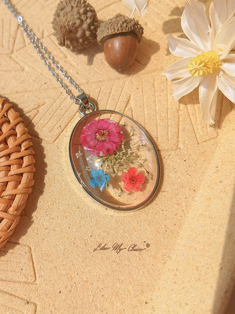 Collier pendentif en résine avec fleur de Galsang rouge myosotis