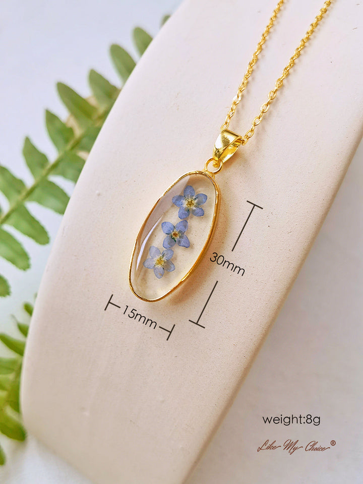 Náhrdelník z přírodní pryskyřice Forget Me Not Golden Oval Pendant