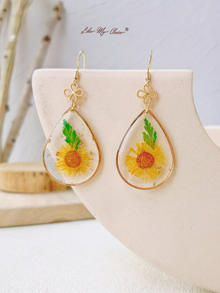 Boucles d'oreilles tournesol en résine, perles et feuilles d'or