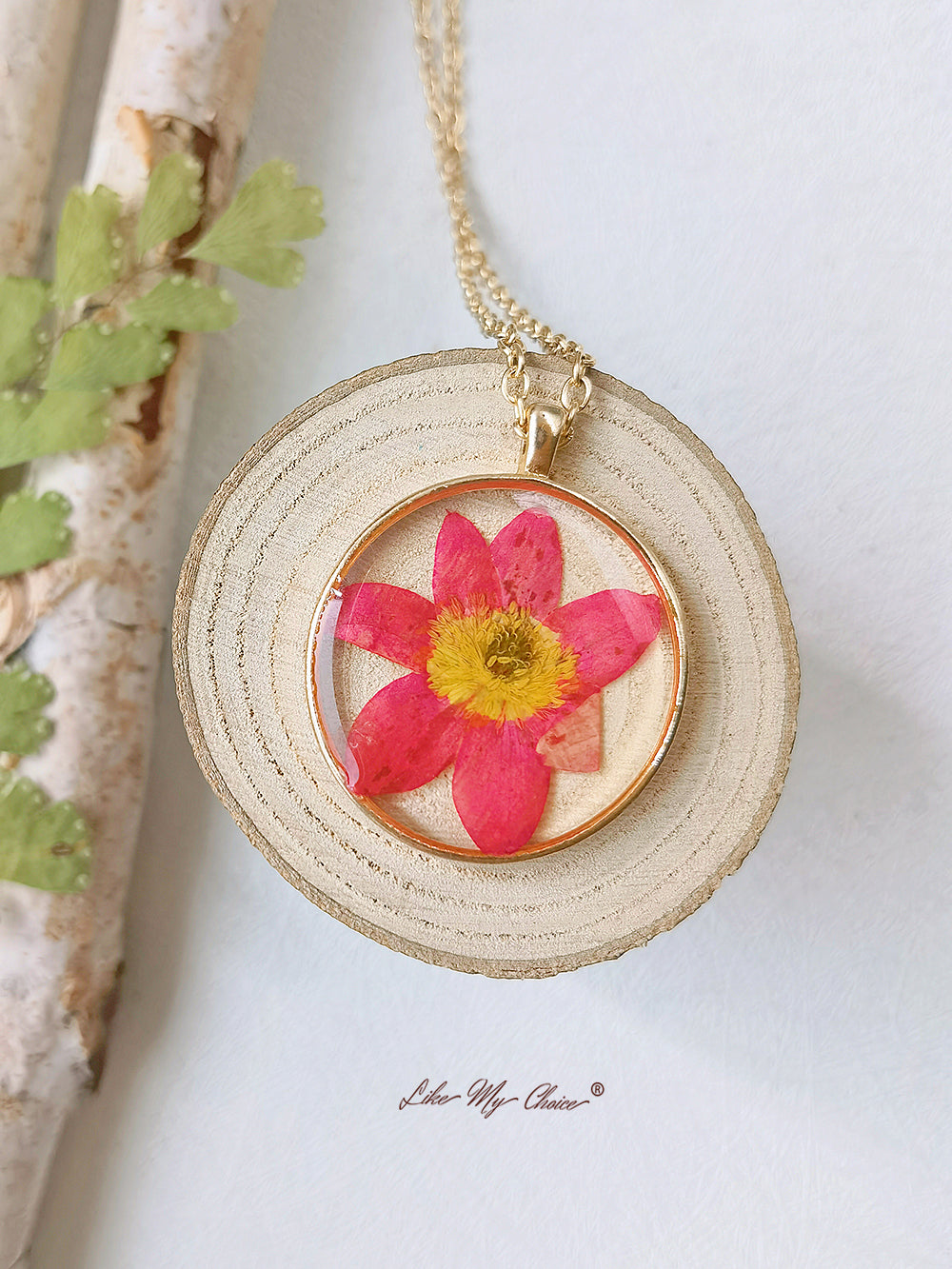 Pendentif fleur d'euphorbe rouge