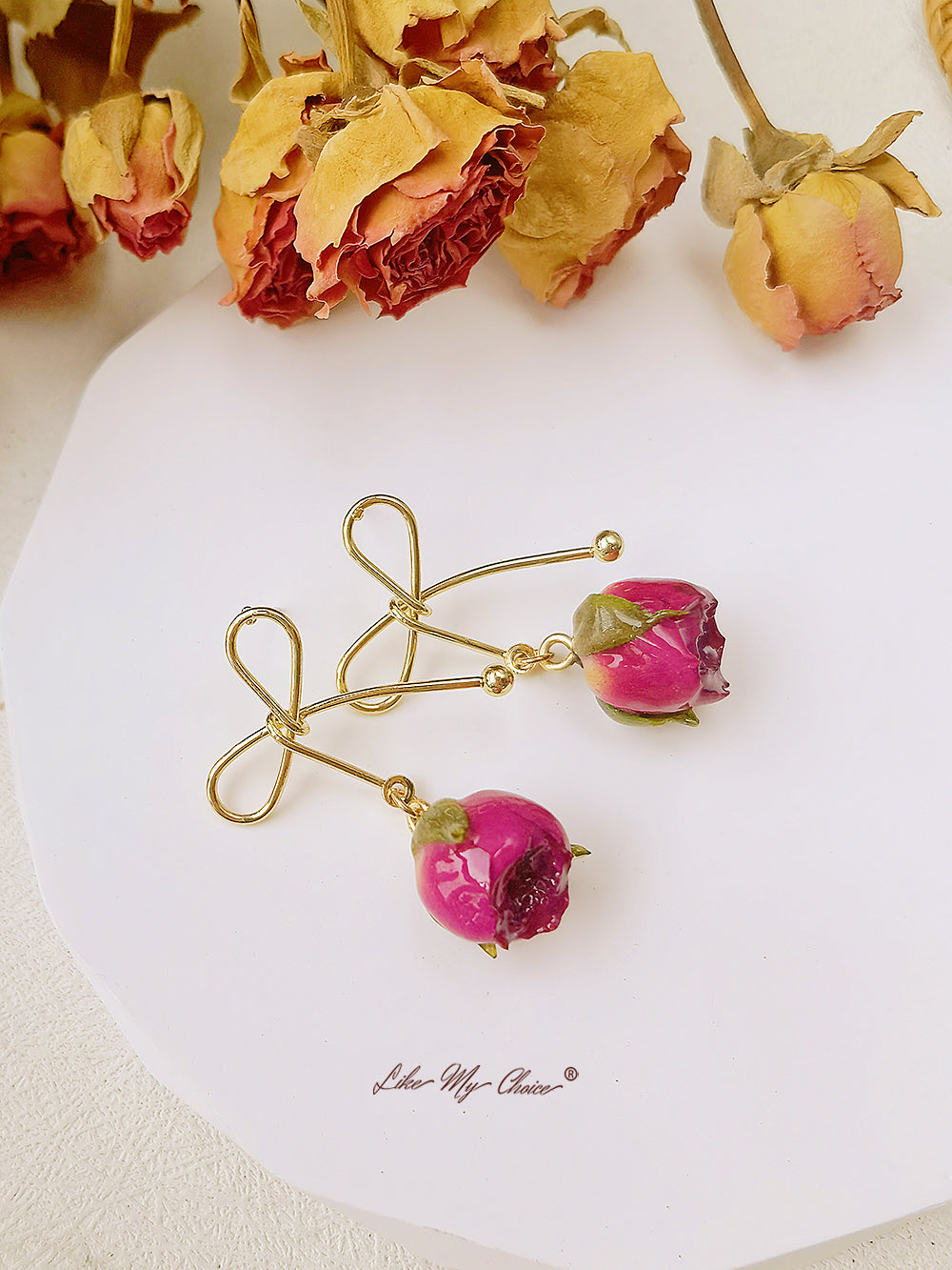 Boucles d'oreilles fleurs séchées noeud rose