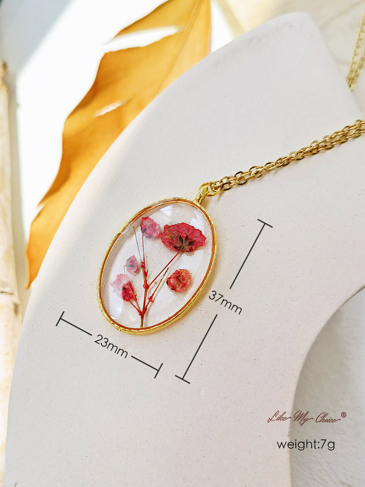 Collana con ciondolo a forma di bocciolo di narciso rosso fatta a mano