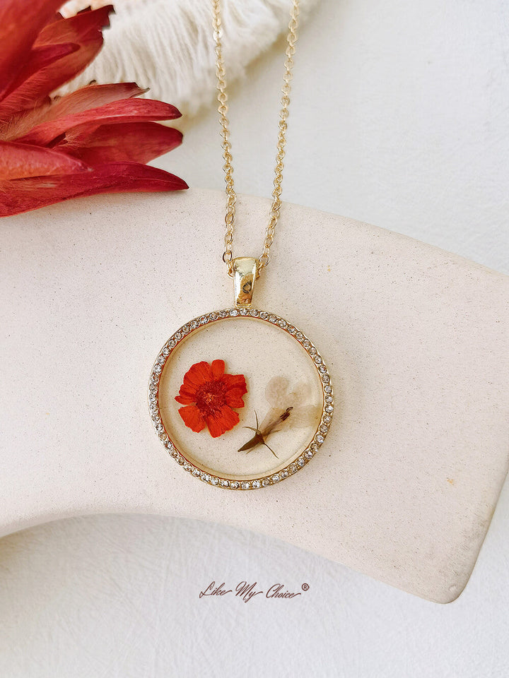 Collier pendentif fleur en résine et cristal rond