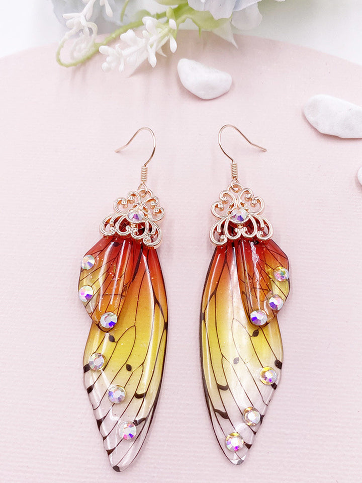 Boucles d'oreilles Aile de papillon en strass jaune Aile de cigale en cristal