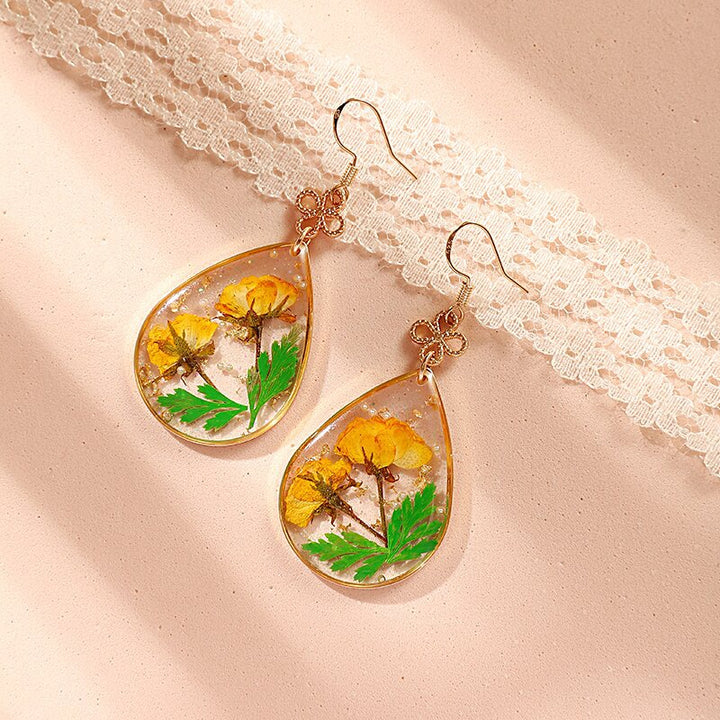 Κίτρινο σκουλαρίκι από ρητίνη Cosmos Sulphureus Drop Earring