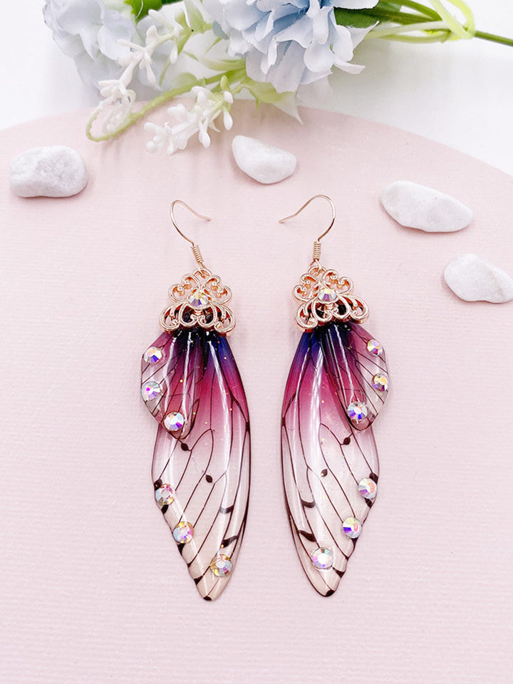 Boucles d'oreilles Aile de papillon en strass violet Aile de cigale en cristal